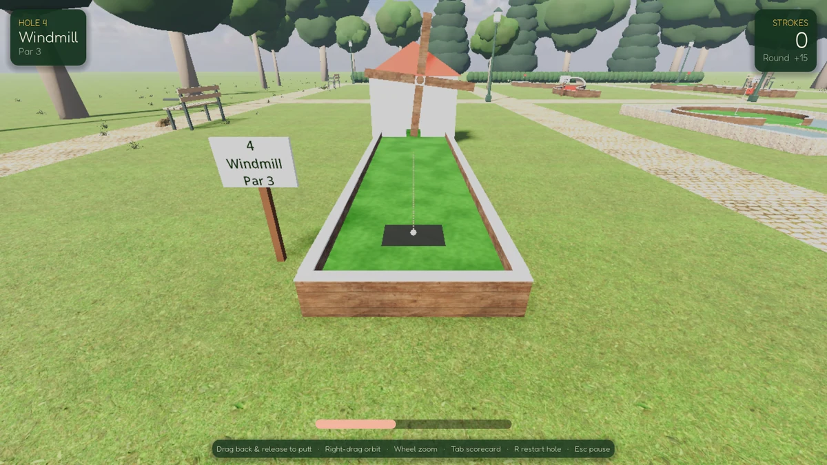 Nine Greens: lining up a putt on the Windmill hole, with the aim line and power bar showing